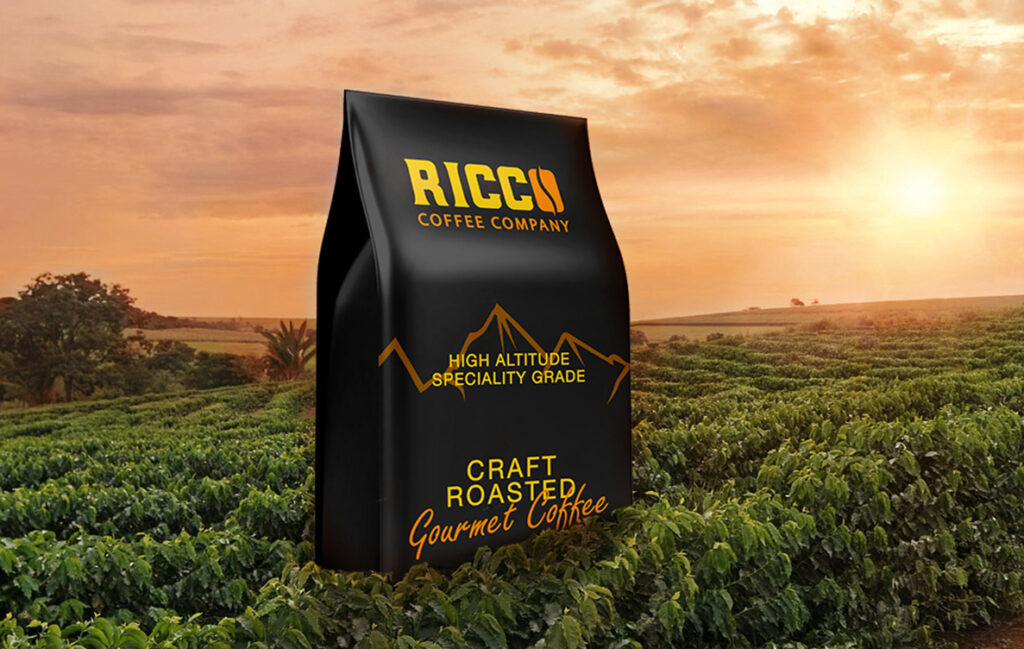 Ricco Coffee Company bag set in a high-altitude coffee farm at sunrise, representing single origin, farm-specific specialty coffee grown in mountainous regions